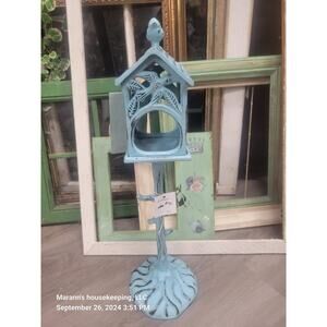 Blue metal birdhouse